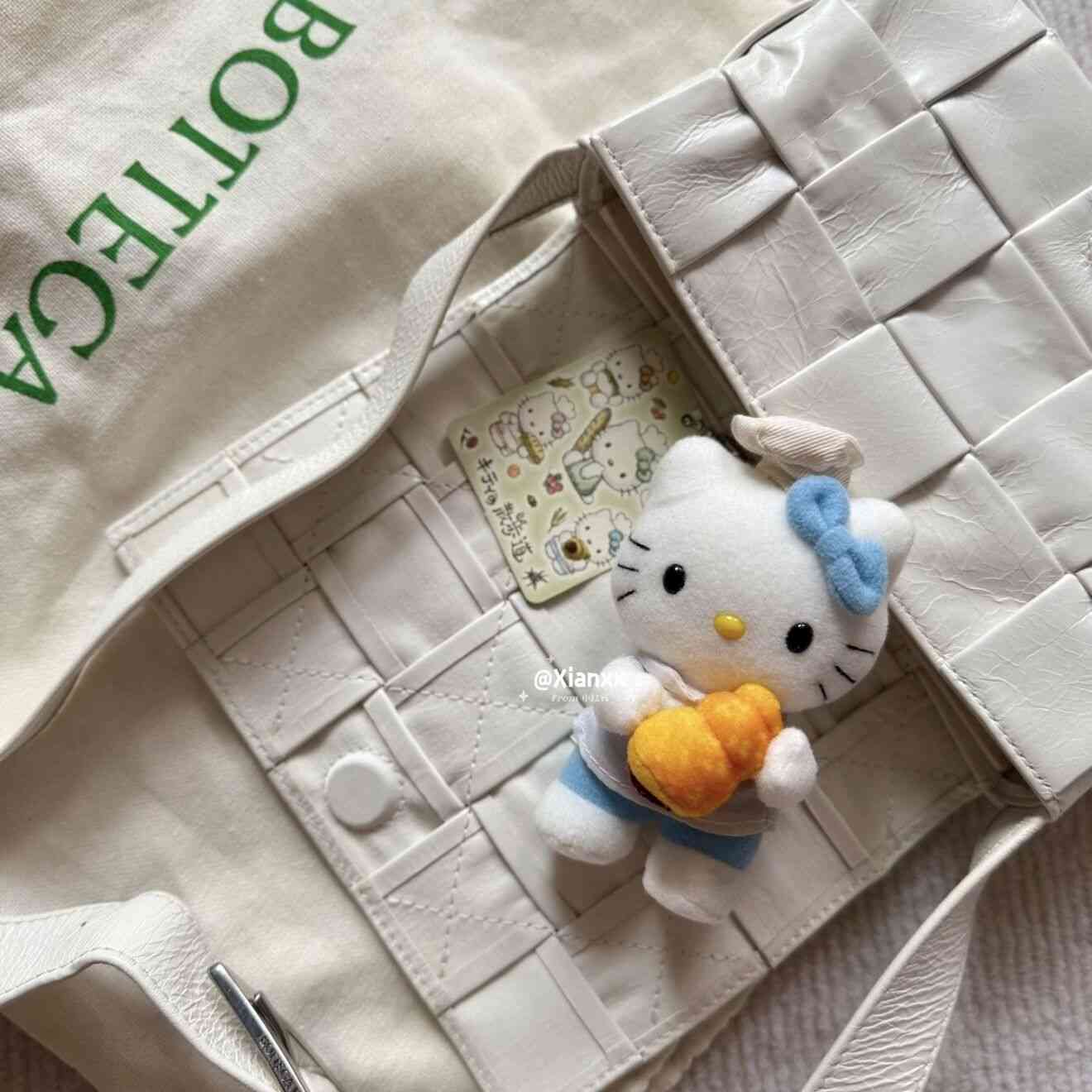 Thumbnail of Vintage Sanrio Hello Kitty Hugging Croissant Plush Charm